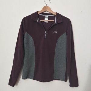 The North Face size medium fleece pullover top. Maroon gray